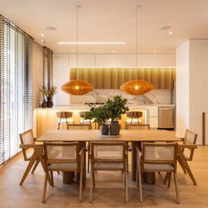 Wood and woven furniture in a warm dining interior