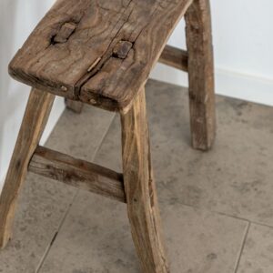Weathered handmade wooden stool
