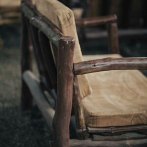 Hand-built wooden armchair with natural grain