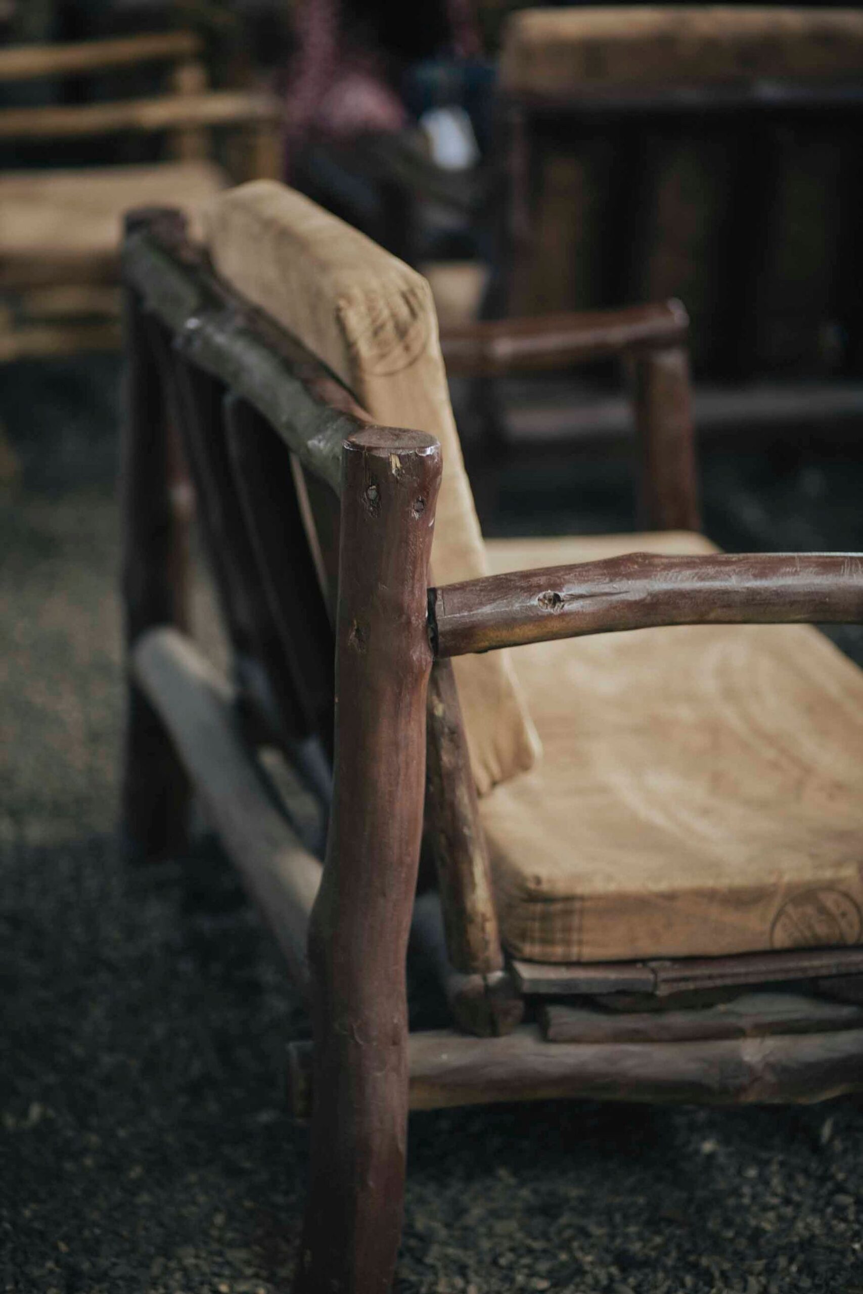 Hand-built wooden armchair with natural grain